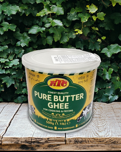 aviv8941_A_wooden_table_with_a_leafy_green_background_84747a43-2464-4a5c-a31d-369fe859242e copy