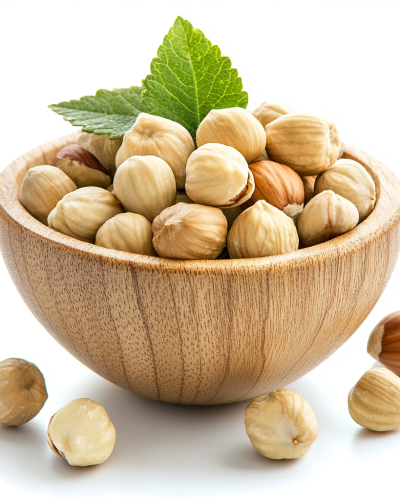 aviv8941_Blanched_hazelnuts_in_a_wooden_bowl_on_a_table_with_ha_9e7b84b0-9a60-42fe-8372-45f5a9c2e52f