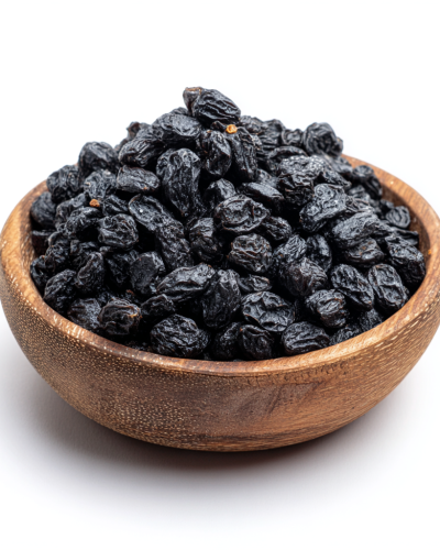 aviv8941_tiny_black_Uzbek_raisins_in_a_wooden_bowl_on_a_white_b_2d338488-e4b3-433e-adcb-788f36323862